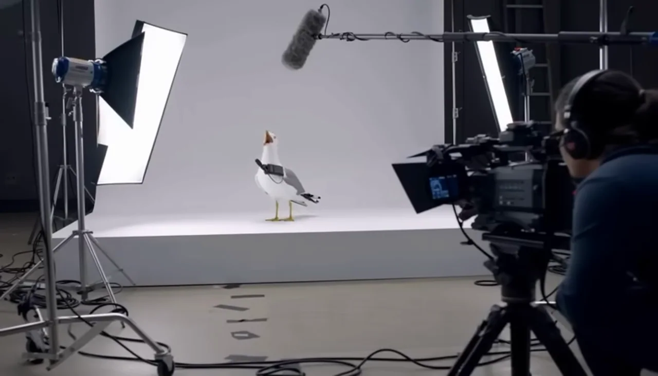 Wide views include cameras, lights, and microphones around the characters.