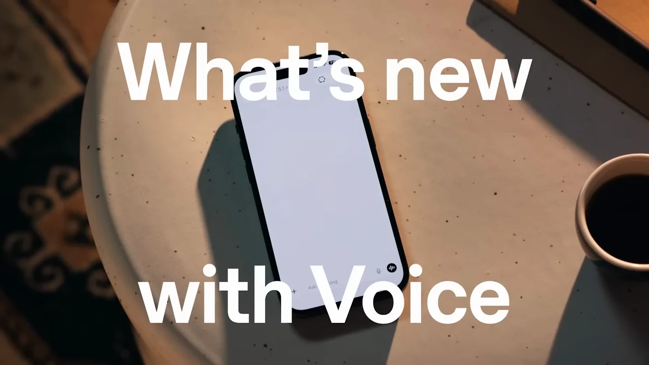 Large title text overlays the phone and tabletop.